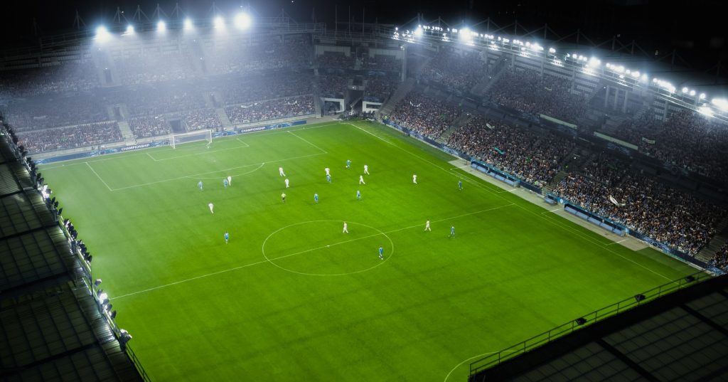 a football field full of players